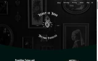 Heart in Hand Tattoo Parlor website
